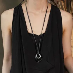 Retro light luxury black agate round leather rope long necklace female niche design irregular pendant sweater chain tide