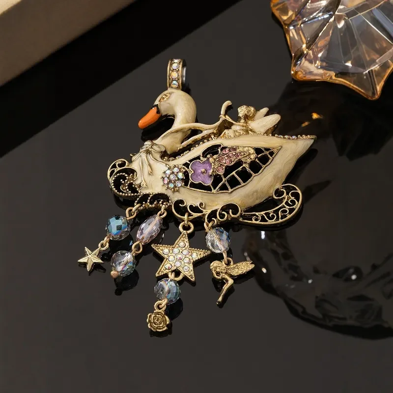 Qingdao jewelry vintage medieval style high sense niche retro drip enamel white swan fringed KF pendant