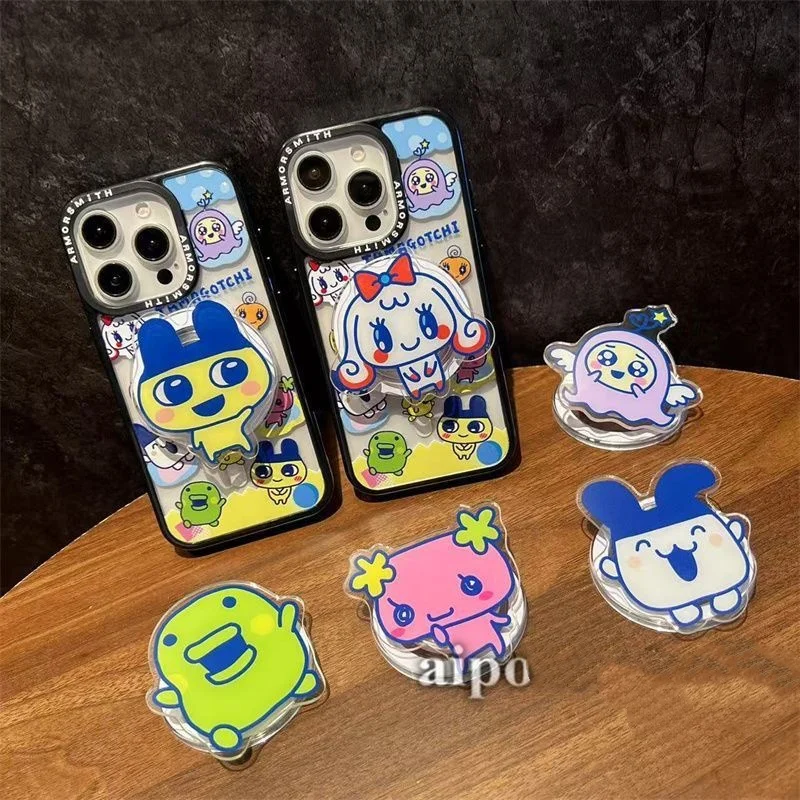 

Tamagotchi Kawaii Phone Holder Detachable Cartoon Telescopic Airbag Bracket Desktop Lazy Person Back Sticker Gifts for Boy Girls