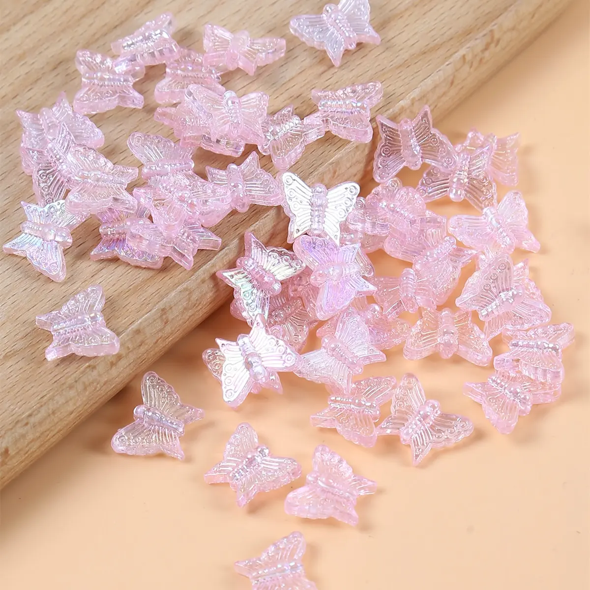 50 pink butterfly beads for handcrafting