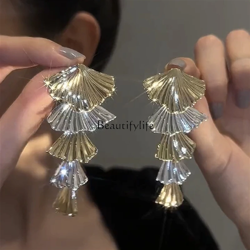 

Metal cold wind earrings, apricot leaf long light luxury high-end earrings.