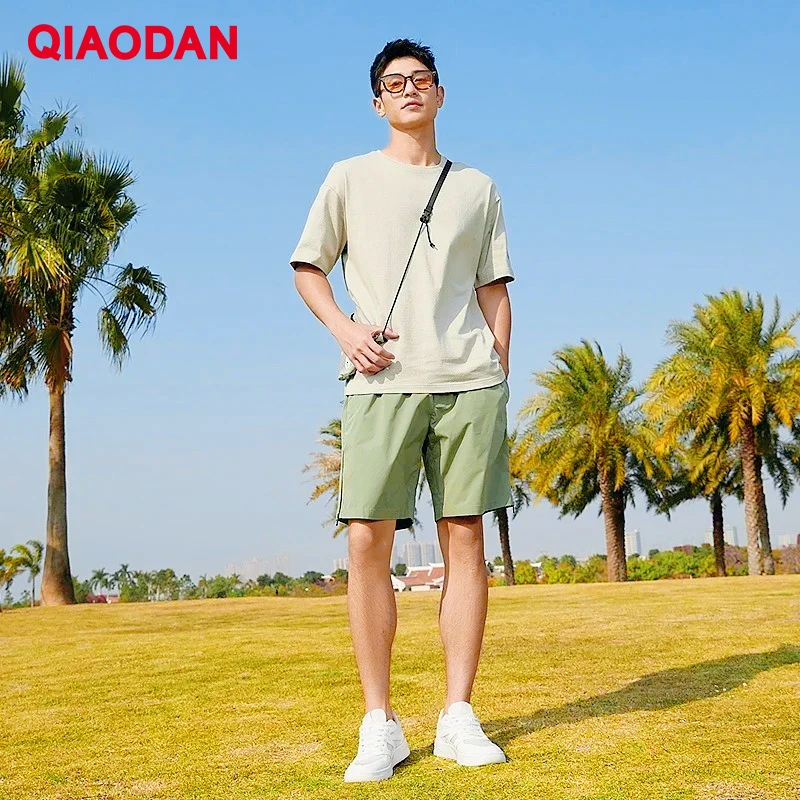 

QIAODAN вязаные черные футболки для мужчин, лето 2024, легкий дышащий свободный женский повседневный топ с короткими рукавами для пар, XHS23241957