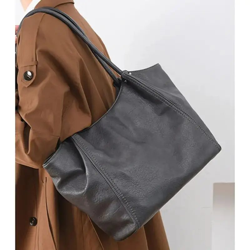 

2025 High Quality Large Capacity Commute Style PU Shoulder Bags Solid Zipper Sense of Luxury Classic Style Tote Bags for Women