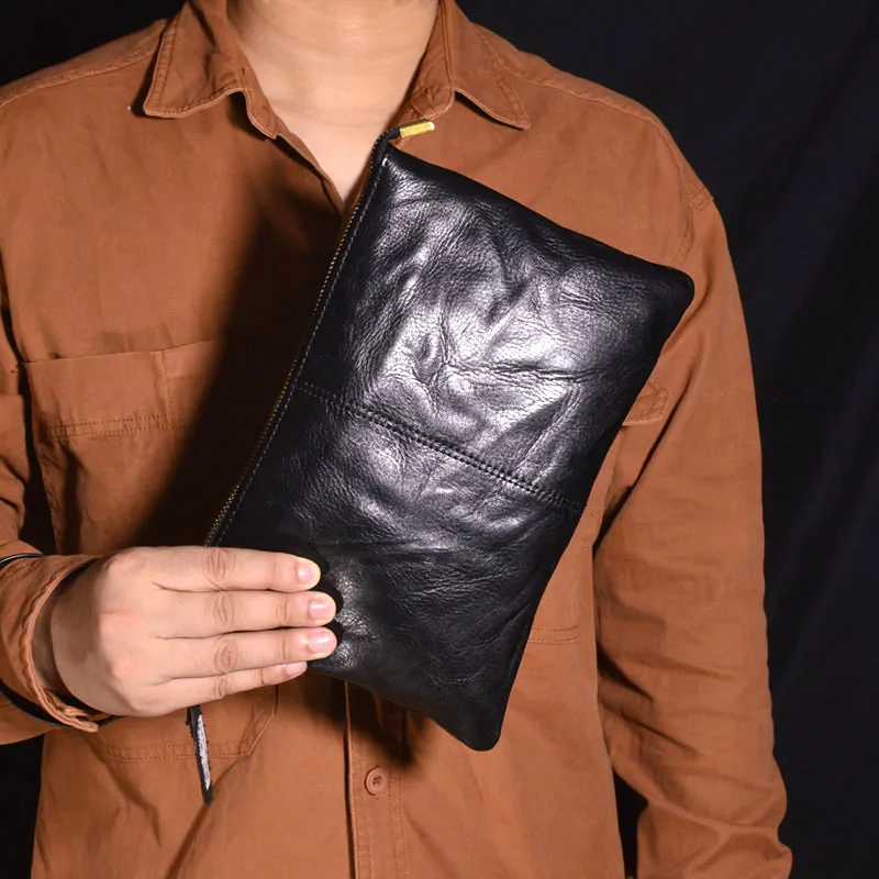 

AETOO Fold personality design men's casual hand baotou layer cowhide underarm bag business commuter leather wear-resistant new