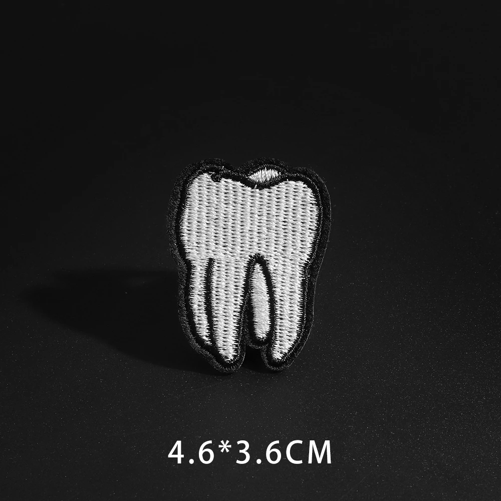 Size: 4.3 * 3.6CM High quality black and white teeth Embroidered Patches Appliques 3D Diy Clothing jacket Badge