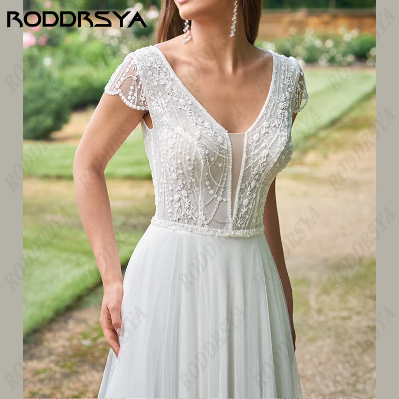 RODDRSYA-Robe de mariée dos nu en tulle bohème pour femme, col en V, manches cape A-Line, robe de patients de plage, haute fente, fête de la mariée bohèmeRobe de mariée dos nu en tulle bohème pour femme, col en V, manc