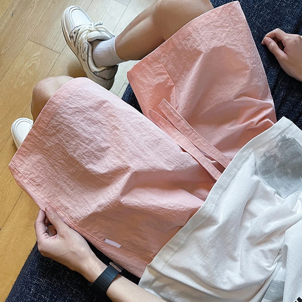 شورت فضفاض مناسب مقاس 2XL شورت رجالي رفيع لجميع المواسم يرتدي ملابس رياضية للشاطئ متوسطة الخصر لأنشطة الشاطئ