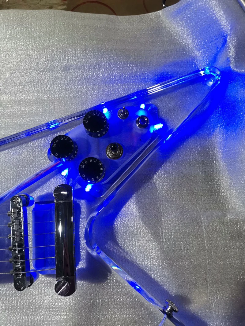 Good quality Fly V style acrylic electric guitar with blue led light