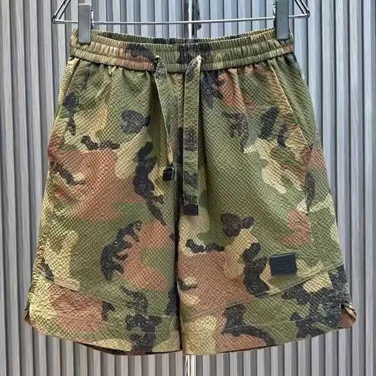 

Летние тонкие мужские брюки, корейские простые свободные модные дышащие пятиczęściowe модные спортивные повседневные камуфляжные брюки средней длины