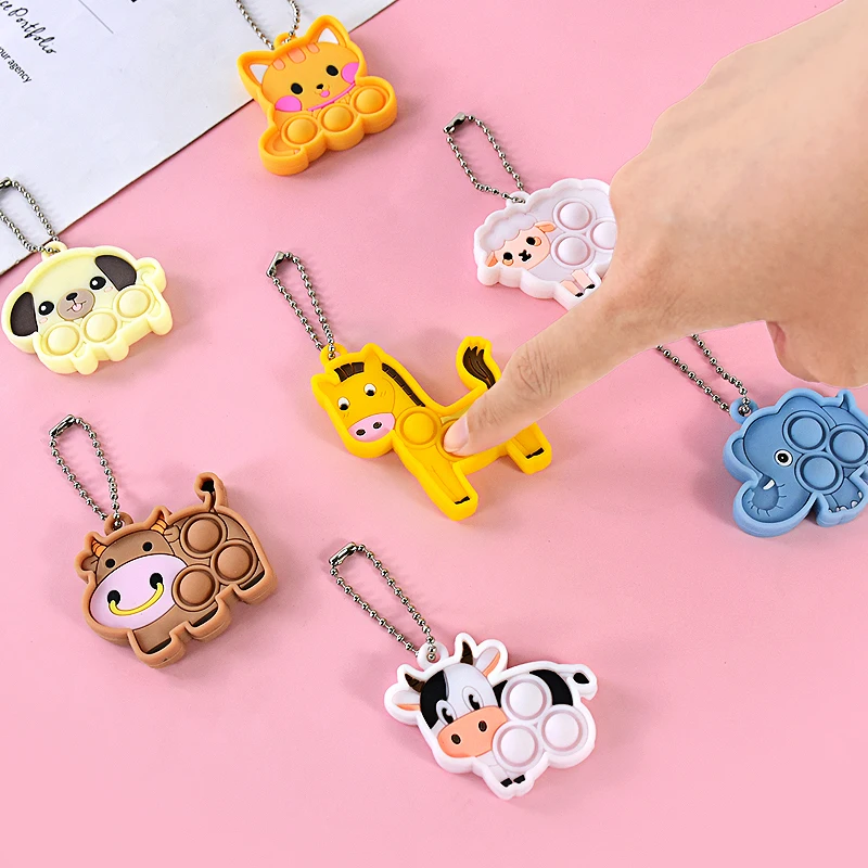 Mini llavero de dibujos animados de 7 piezas para niños, juguetes sensoriales Kawaii para aliviar el estrés, perro, gato, elefante