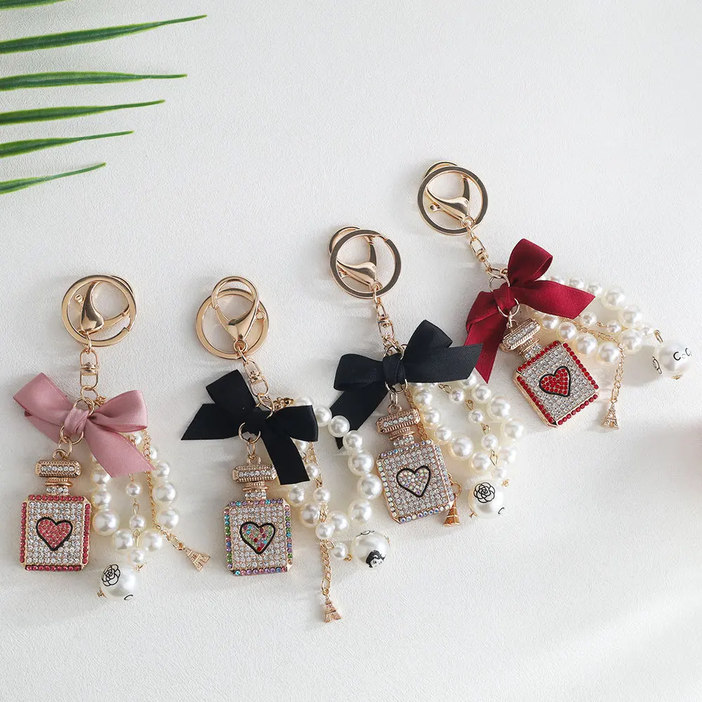 Perfume Bottle Bowknot Alloy Key Chain Pendant Bag Pearl Pendant Creative Gift, Valentine's Day Gift, Jewelry