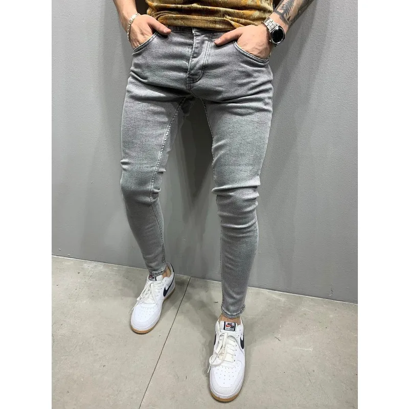 جينز رجالي أوروبي وأمريكي عالي الجودة بأقدام ضيقة مرنة للتجارة الخارجية محطة مستقلة كلاسيكية بأربعة ألوان