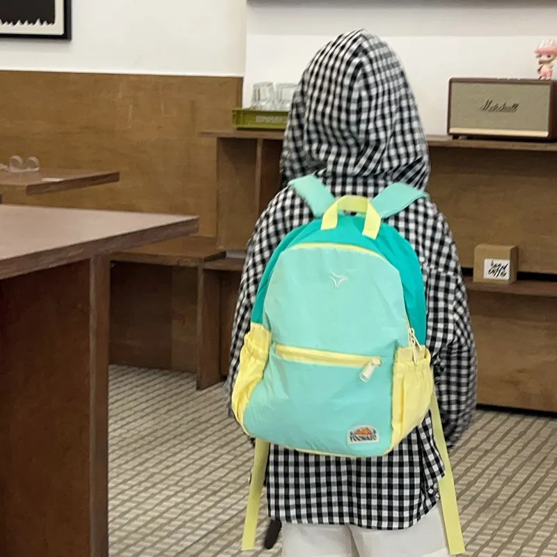 Simpatici zaini di grande capacità per ragazzi e ragazze, zaini scolastici leggeri e abbinati ai colori per studenti della scuola materna