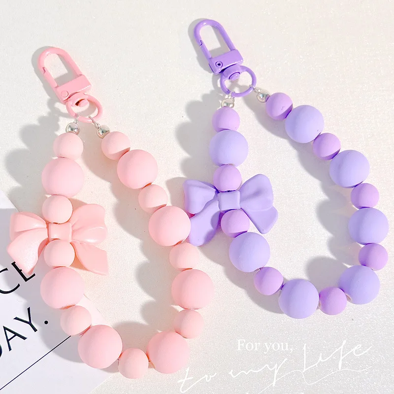 الوردي اللؤلؤ القوس المفاتيح مطرز قلادة مكافحة خسر حبل الهاتف المحمول سلسلة سماعة حقيبة سيارة المفاتيح حقيبة الظهر التبعي