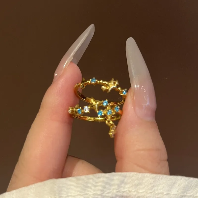[المشرق المجرة] الذهب المرصعة بالنجوم شرابة نجمة خاتم المرأة الأزياء الخفيفة الفاخرة مطعمة الزركون المتقدمة الشعور الدائري