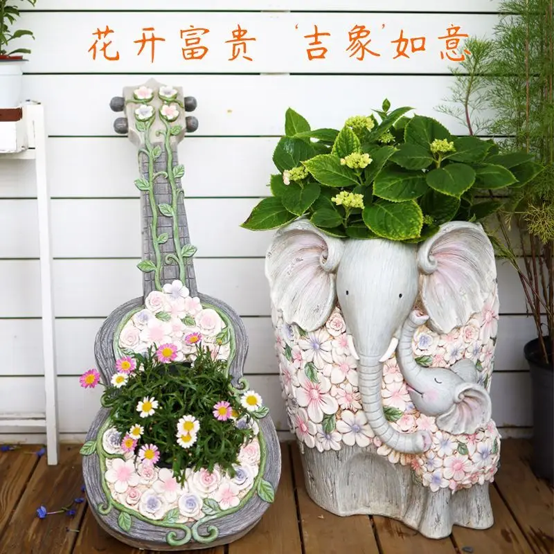 Elephant planter pair - realistic decorative ornaments for outdoor garden entryways