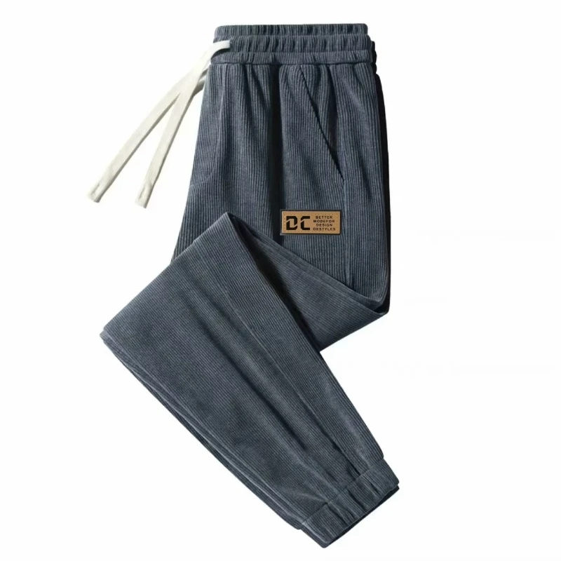 Calça de moletom casual masculina de veludo cotelê com forro solto outono inverno esportes com cintura elástica e fibra de poliéster
