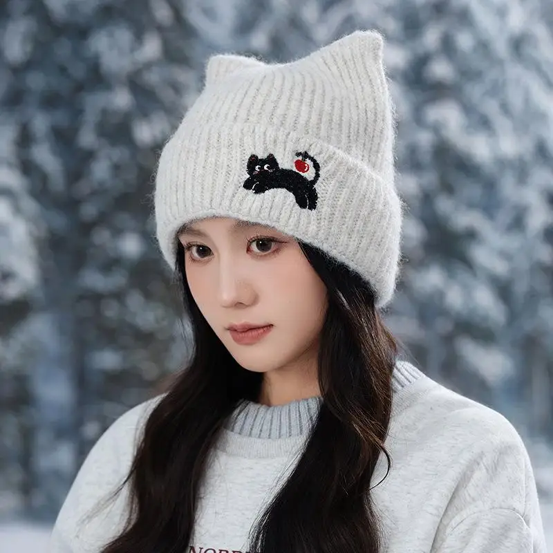 قبعة شتوية دافئة من القطيفة على شكل أذن القطة على شكل جمجمة للنساء على الطراز الكوري قبعة بلوفر ثلج حراري للاستخدام الخارجي للفتيات