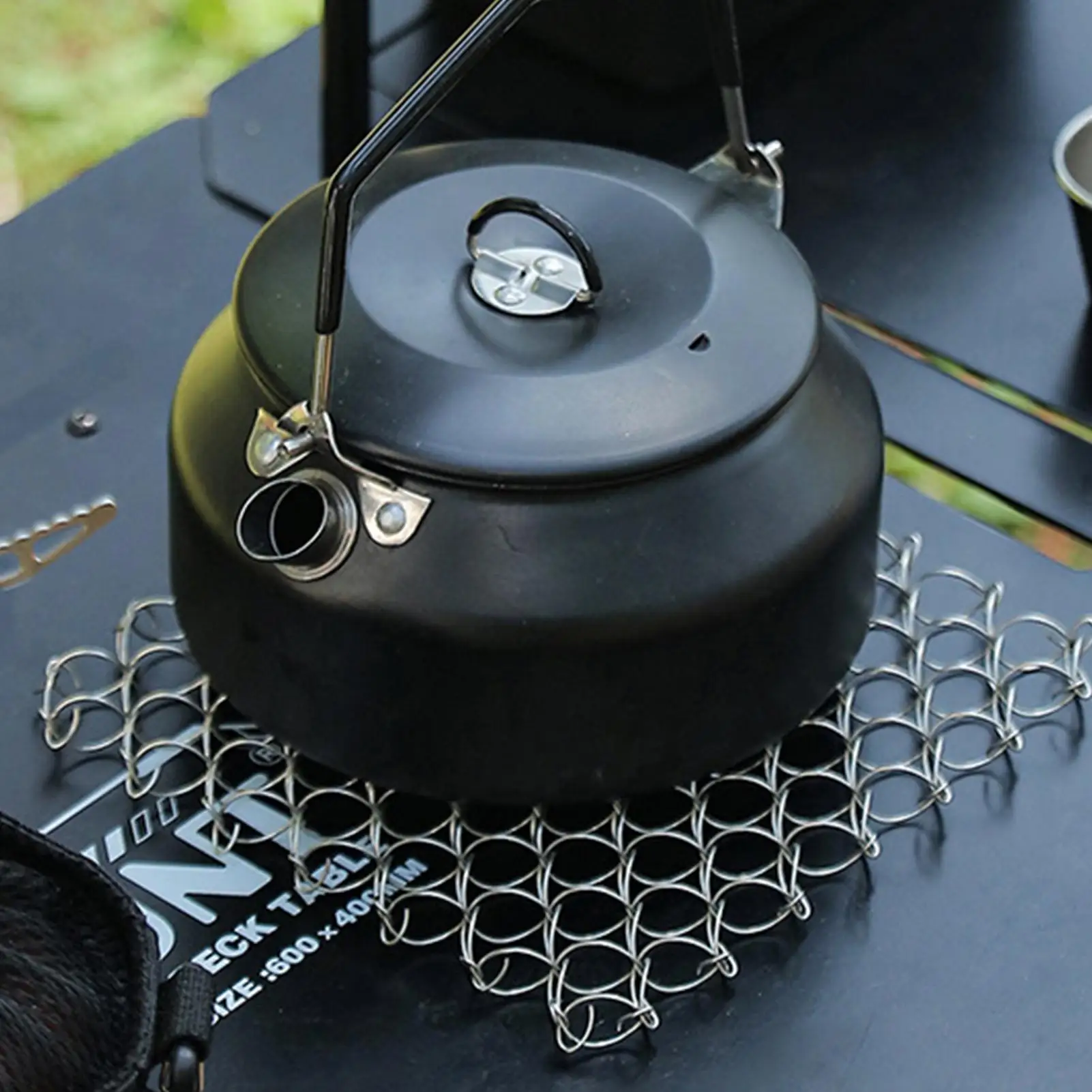 أدوات المائدة بساط معزول الربيع مكافحة تحرق وسادة سلك حلزوني الركيزة العزل الحراري وسادة أدوات مائدة من الفولاذ المقاوم للصدأ حصيرة للتخييم