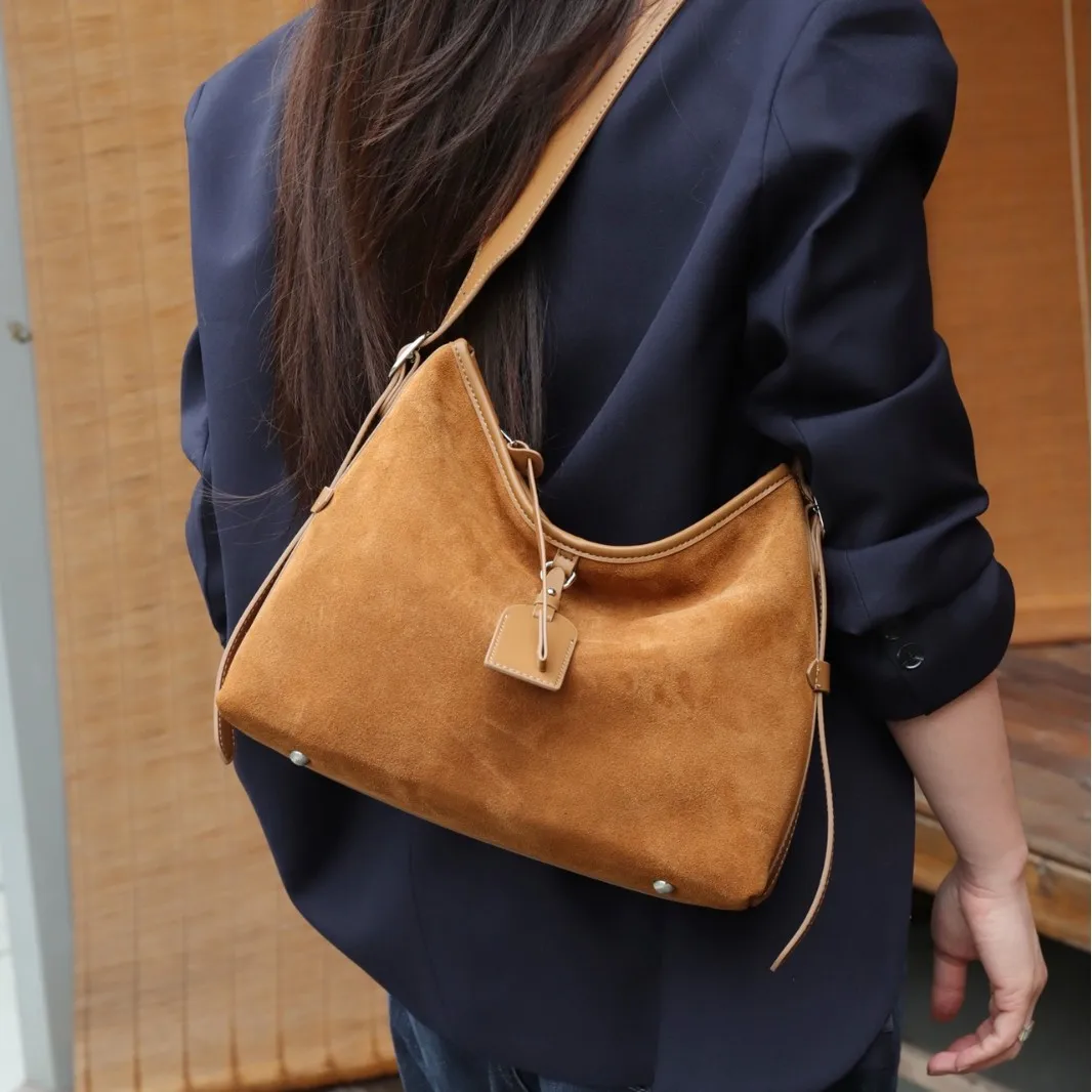 

Женская сумка из воловьей кожи, новинка 2026, сумка-тоут для ленивого ветра, большая вместительная женская кожаная простая сумка через плечо для пригородных поездок