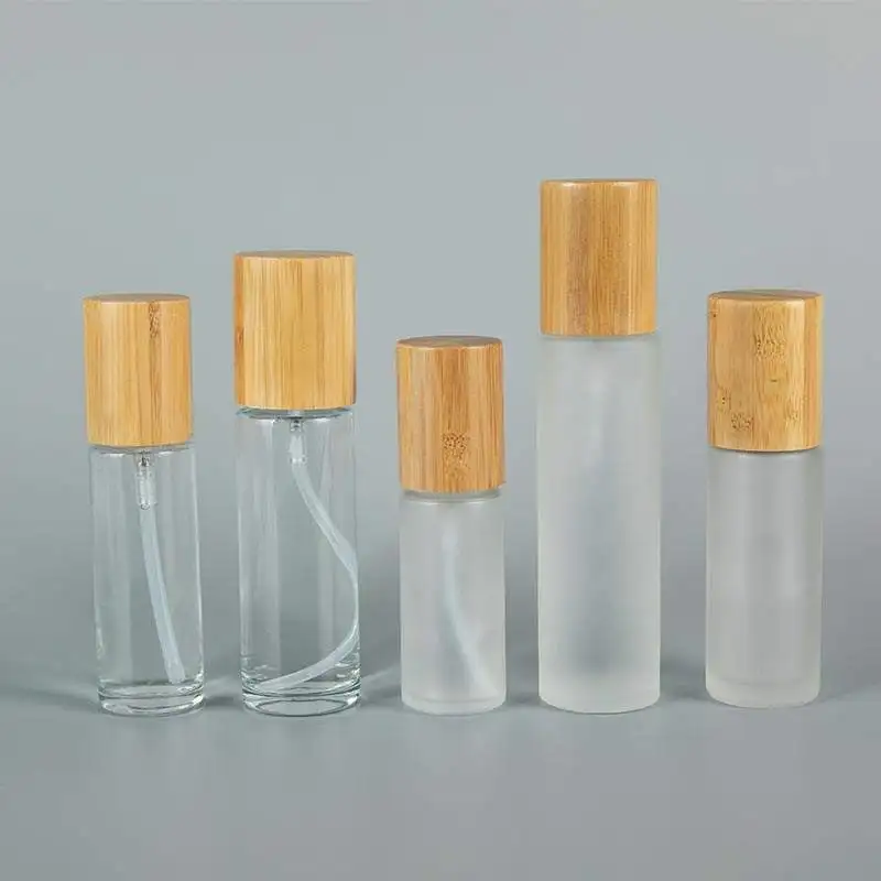 

Bulk 20/30/40/50/60/80/100/120ml Clear Frosted Glass Pump Spray Bottles Natural Wood Bamboo Cover Empty Skincare Beauty Atomizer