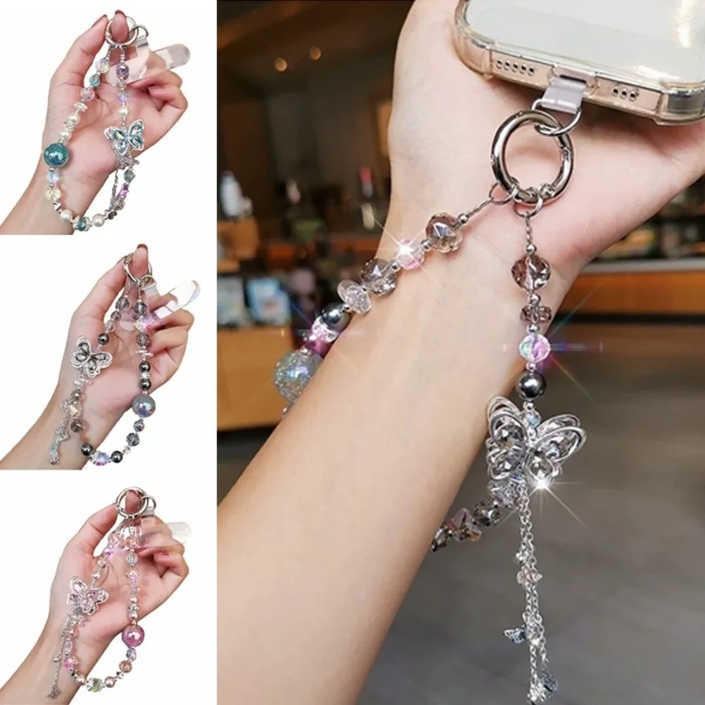 

Ремешок для телефона с кристаллами и бусинами в виде бабочки, цепочка на запястье, защита от потери, роскошный жемчужный шнурок для мобильного телефона, для женщин/девушек