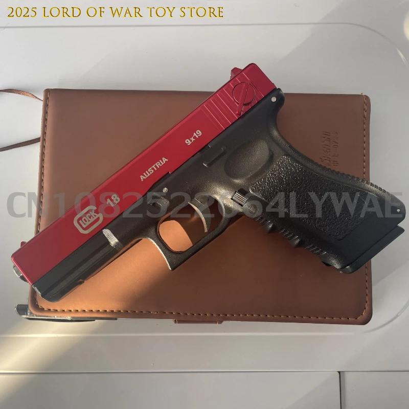 고품질 GELUOKE 빈 챔버 교수형 기관총 장난감 총 퀵 릴리스 수동 라운드 총알 낮은 잡지 크리스마스 선물