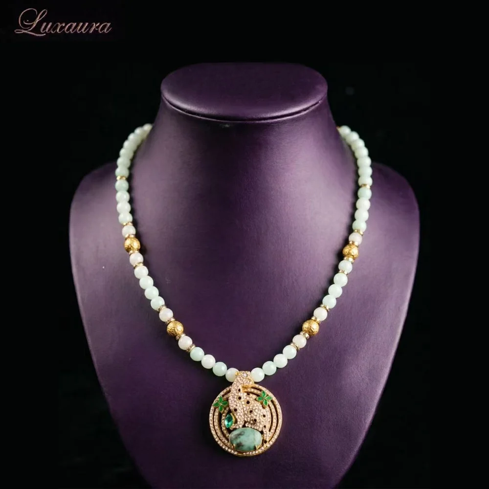 

Vintage jewelry featuring a fashionable and classic gold geometric necklace design paired with Bohemian style women's necklace