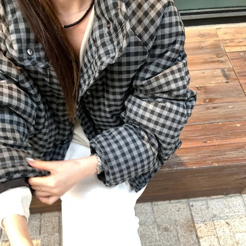 سترة نسائية قصيرة منتفخة سميكة بطة أسفل الإحساس فضفاضة تناسب معطف الشتاء كم طويل ريترو ستايل صغير الحجم ودية