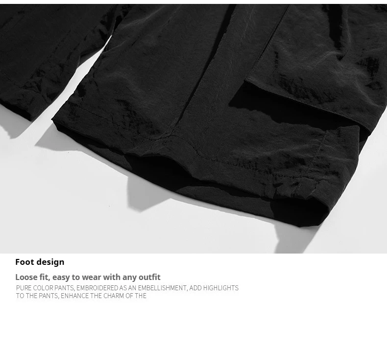 صيف جديد الرجال العلامة التجارية العصرية ملابس العمل السراويل الكورية فضفاضة كبيرة الحجم سراويل تقليدية تنفس التجفيف السريع أزياء الشارع