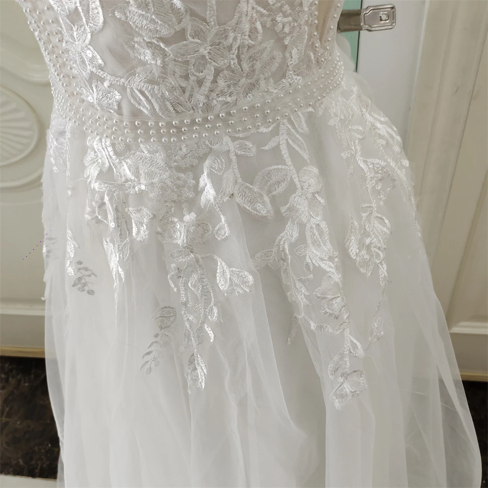 ZJ6053  Lace Appliques Pearls Tulle Wedding Dresses V-Neck Sleeveless Floor-Length Ruffled Bridal Dress Long Wedding Gowns