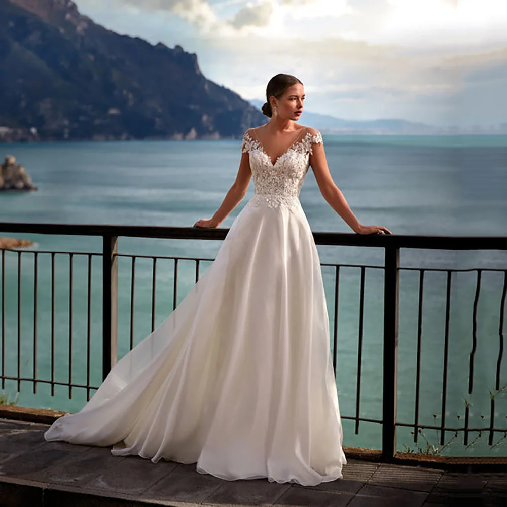 

Cap Sleeve Wedding Dresses 2025 V Neck Lace Appliques A-Line Tulle Brides Gown Classic Backless Bridal Dresses Customized