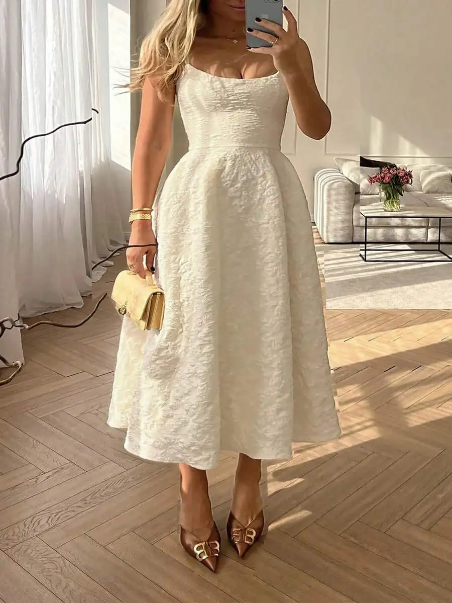 

Elegant White Spaghetti Strap Midi Dress with Cinched Waist and Textured Fabric