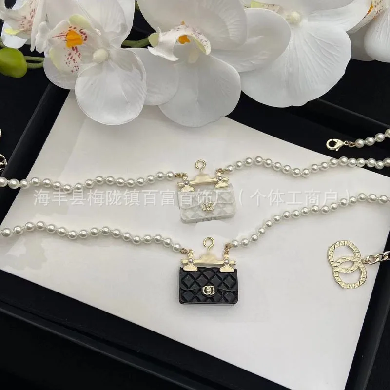 

Small Black and White Hanger Bag Pearl Double C Necklace Versatile Retro Premium Pearl Chain Women