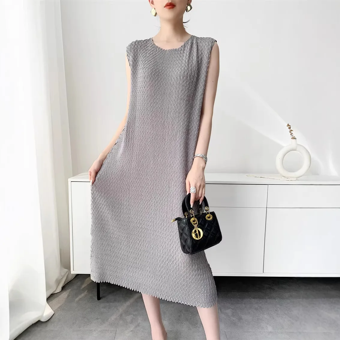 

Miyake Solid Color Women's Pleated Dress Black O-Neck Sleeveless Casual Pullover Mid-Length Dresses 2026 Summer New 2DB7260