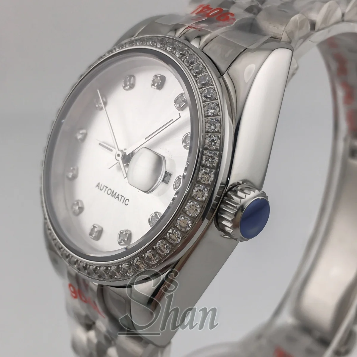 NH05 ファッショナブルな 31mm レディース自動巻き時計、ダイヤモンドベゼルとサファイアクリスタル、日光に晒されたホワイトパール文字盤、防水