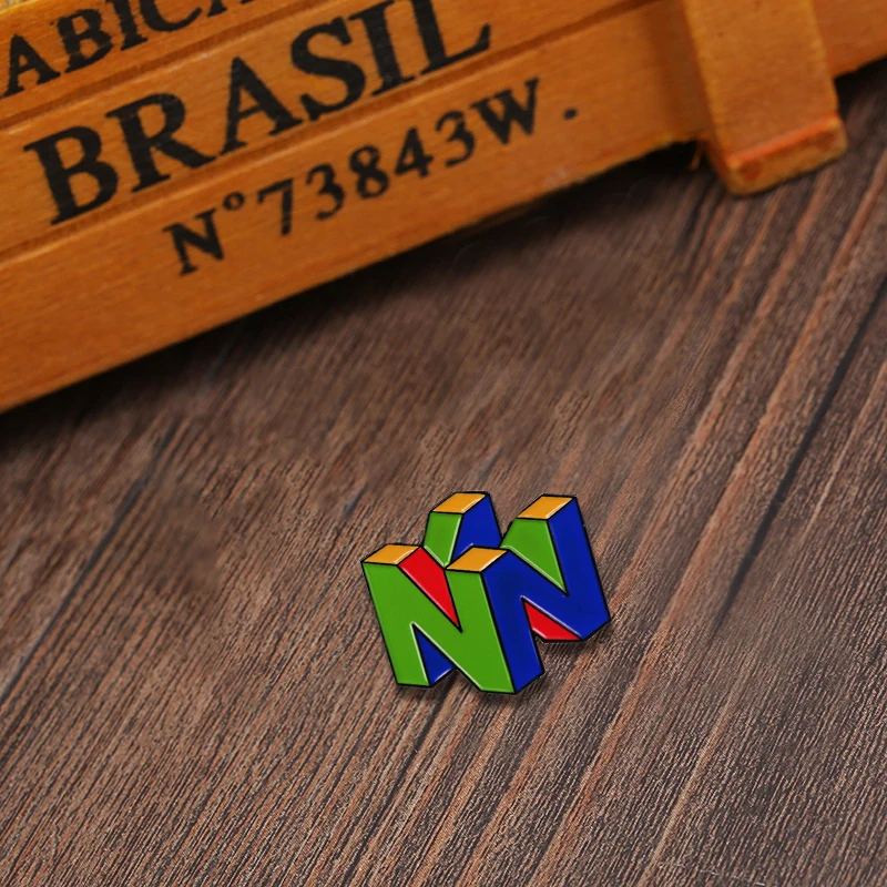 Retro arcade logo brooch