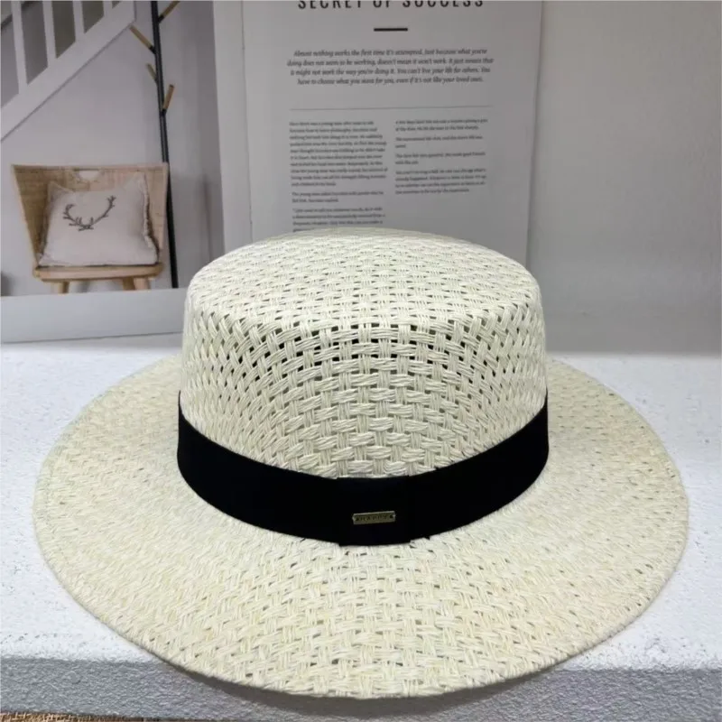 A sunshade salted grass hollowed-out flat-brimmed hat for women top seaside photography vacation and travel