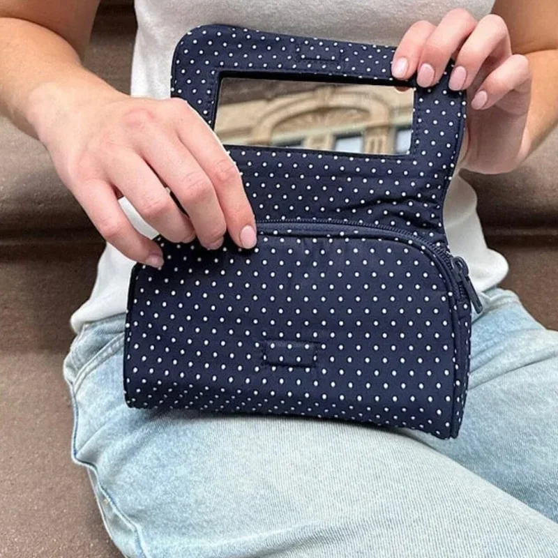 Korean StyleinsHandheld makeup bag with mirror, cute, mini, and portable, perfect for travel and organizing cosmetics