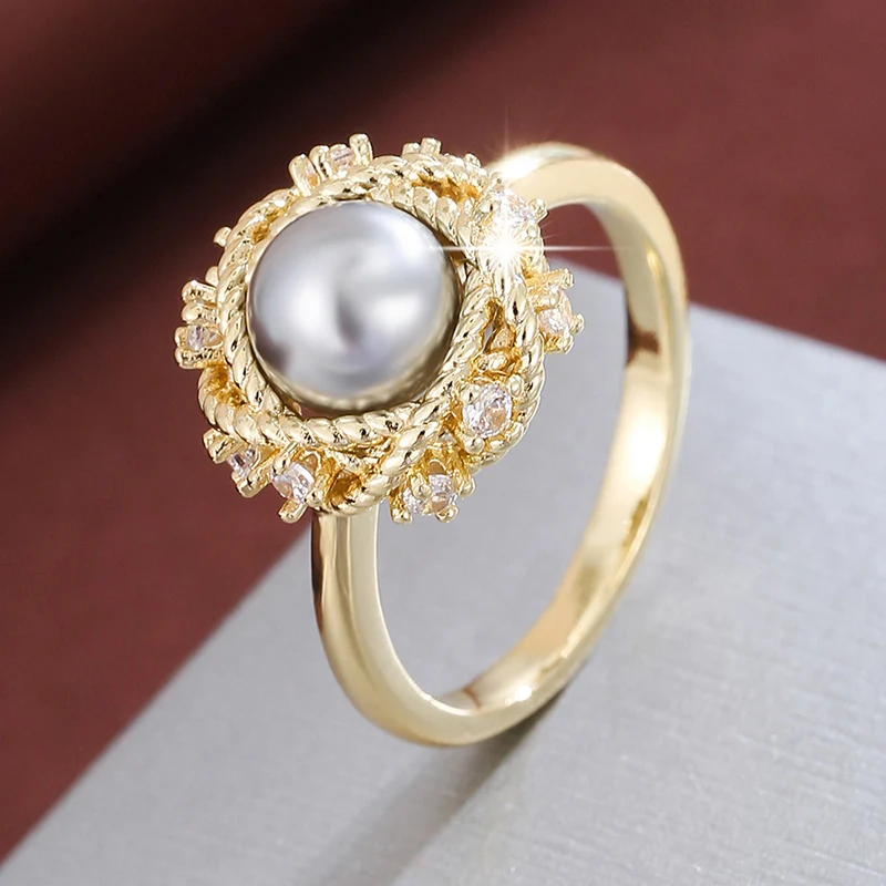 A delicate orb design with Ms. Zircon's ring