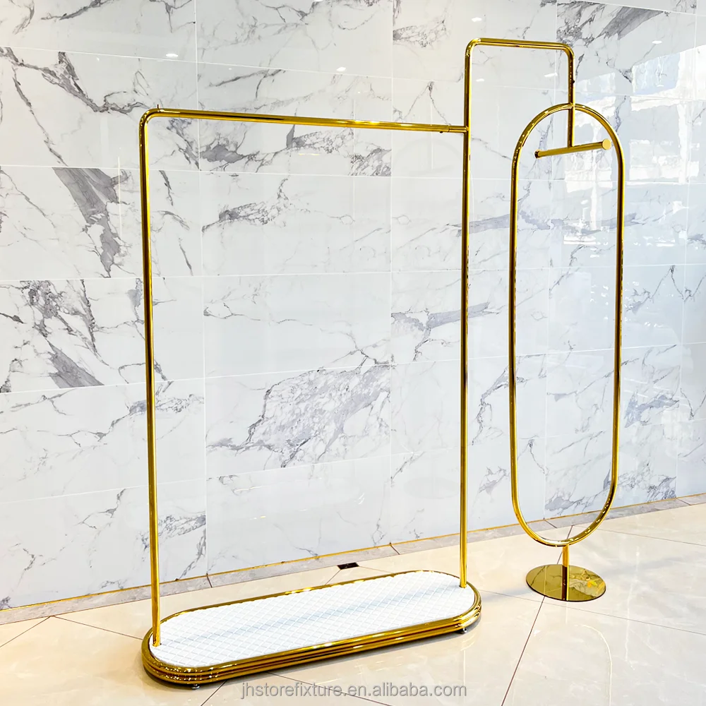 Percha de ropa de acero inoxidable de lujo, dorada brillante, personalizada, de pie, con estantes de exhibición para tienda