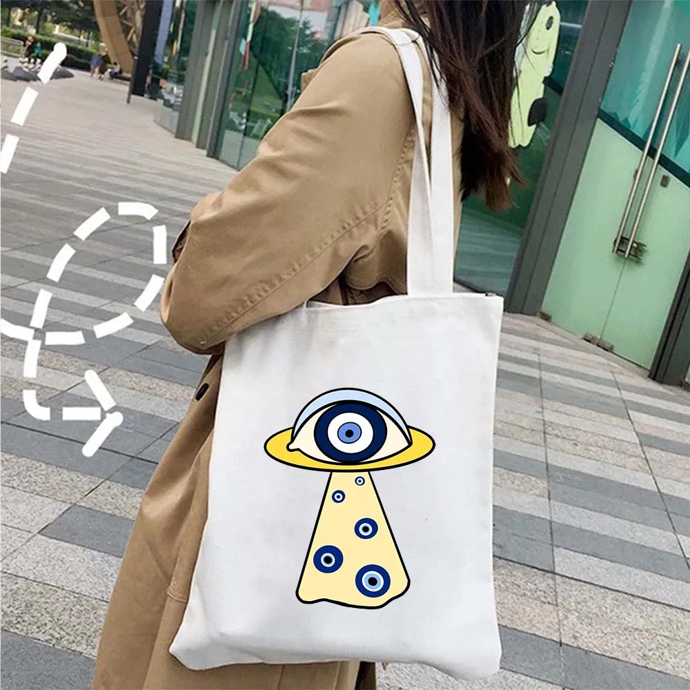 Occhi diabolici colorati Elegante amuleto Nazar blu Greco malocchio Piuma di uccello Shopping Borsa tote in tela Borsa a tracolla da donna