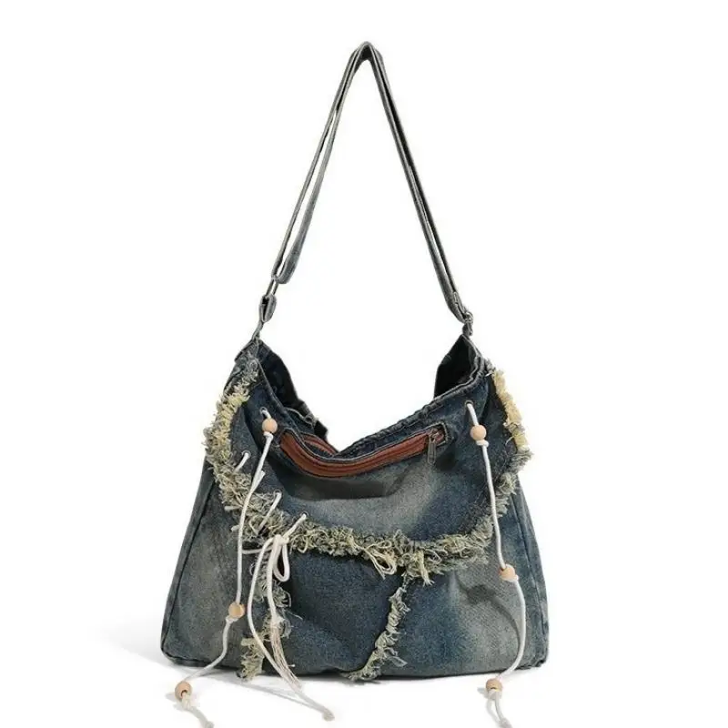 

Designer ladies' high-end classic retro large capacity spicy girl wasteland style large crossbody tassel denim bag