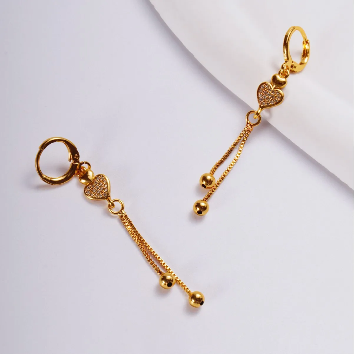 9999 Gold best-selling best-selling trendy minimalist slimming long-style butterfly fringed earrings with fashionable