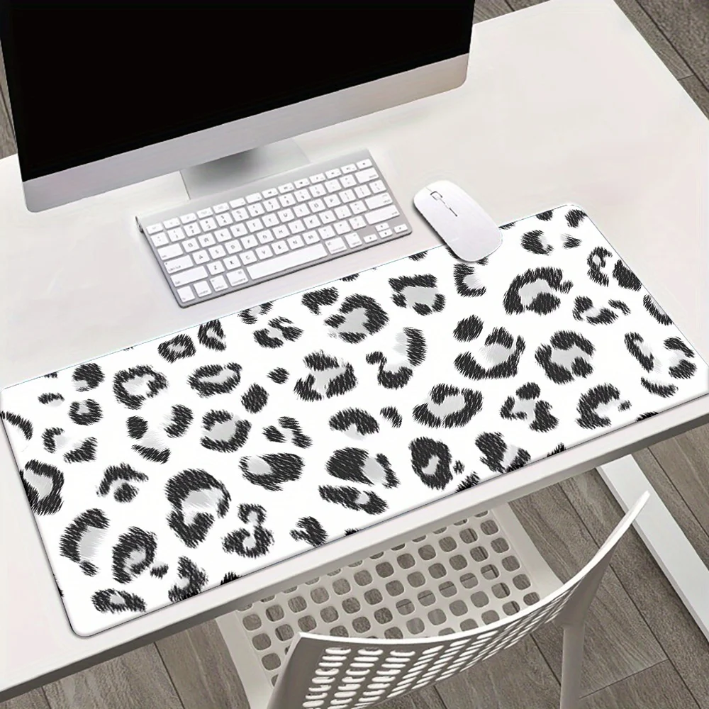 

The leopard print waterproof and anti-slip mouse pad with a soft rubber base is suitable for gamers and professionals