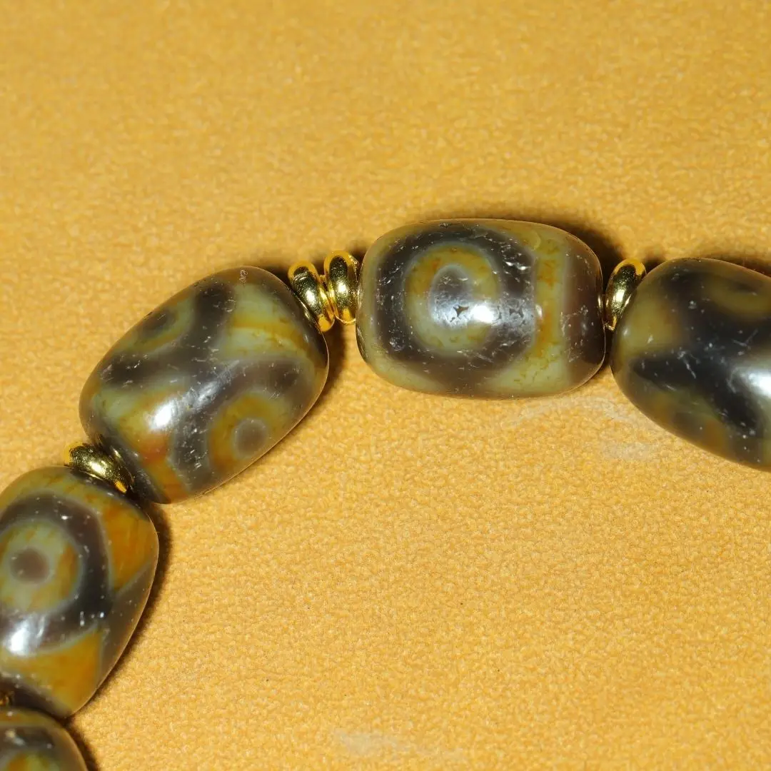 Tibetan area return natural old agate pulp weathered antique old dzi beads three-eye dzi beads bracelet bracelet accessories