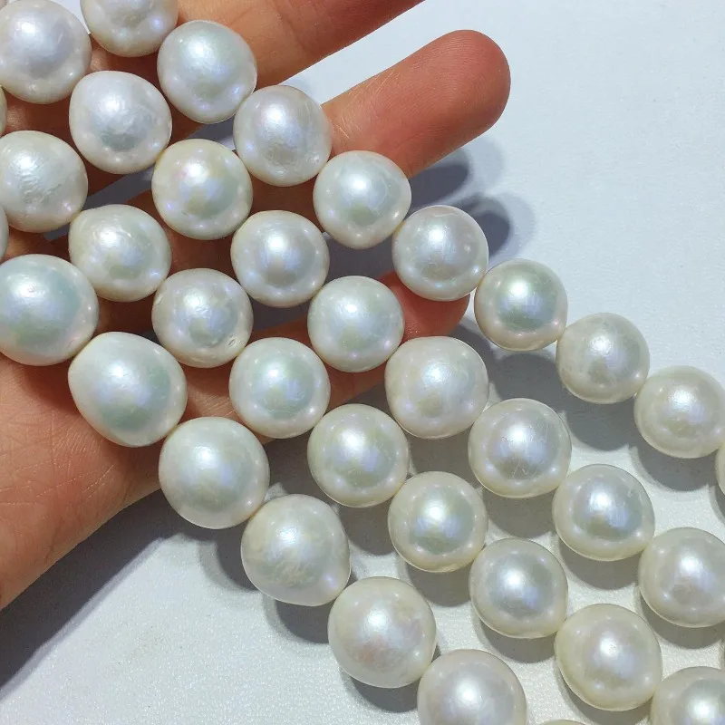

Natural Round 11-14mm White Large Particle Pearls Are Given To Mothers As Necklaces and Finished Bead Products