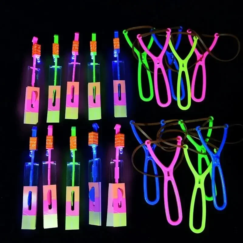 10Pcs Children's LED Rubber Band Rocket Toys Elastic Outdoor Luminous Flash Catapult Games Kids Lighting Up Arrow Party Props