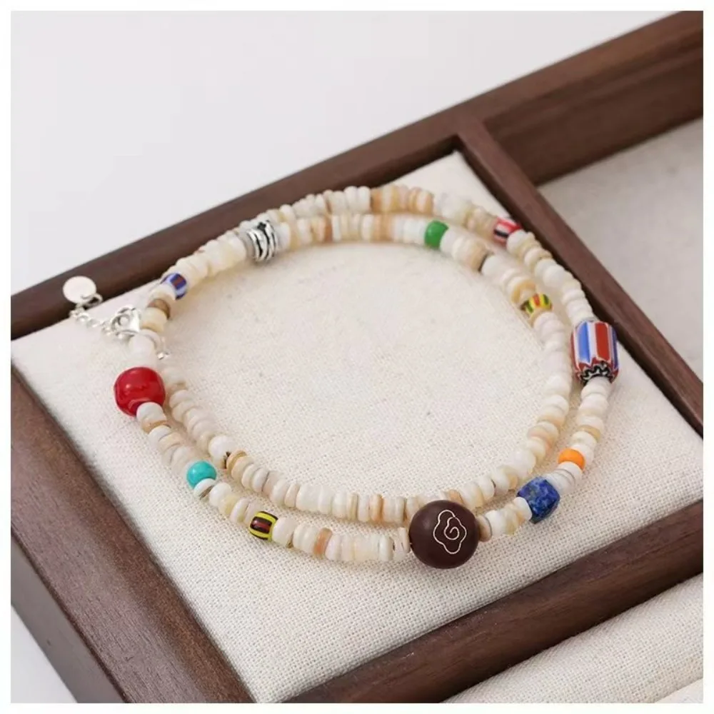 

Star Idol Same Multi Color Coloured Glaze Bead White Shell Beaded Strand Necklace for Women Versatile Clavicle Chain New Product