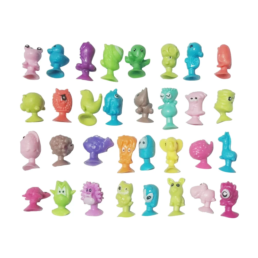 24 pçs dos desenhos animados plástico otário bonecas mini otário brinquedo animal para crianças crianças (padrão aleatório)